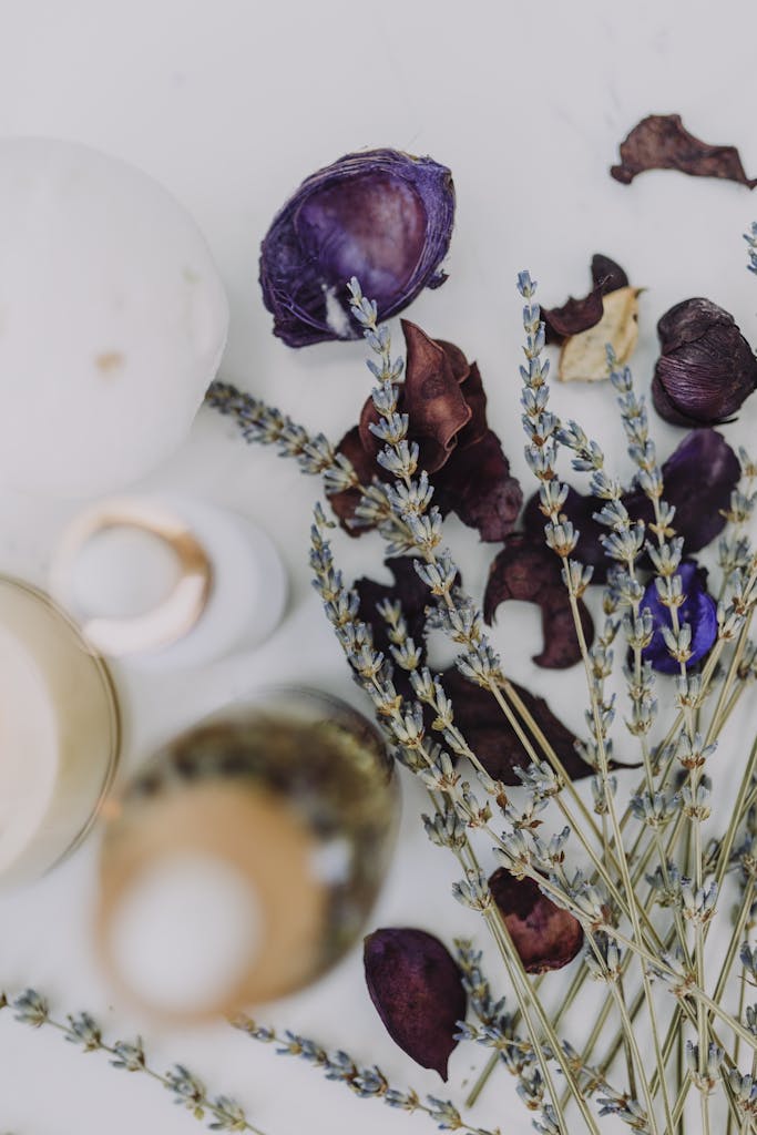 Delicate arrangement of lavender and dried flowers for spa ambiance.
